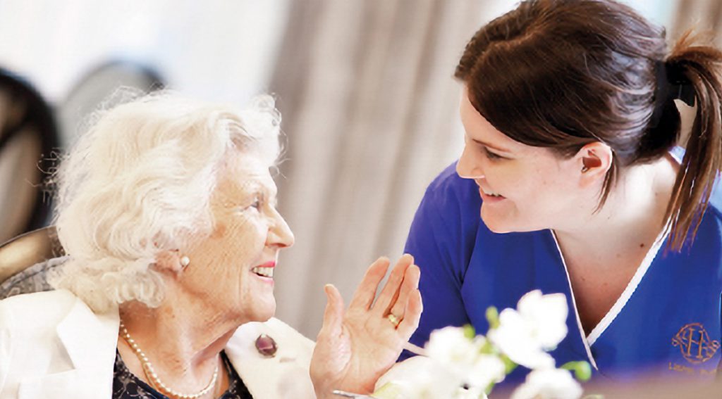Resident and Staff Smiling