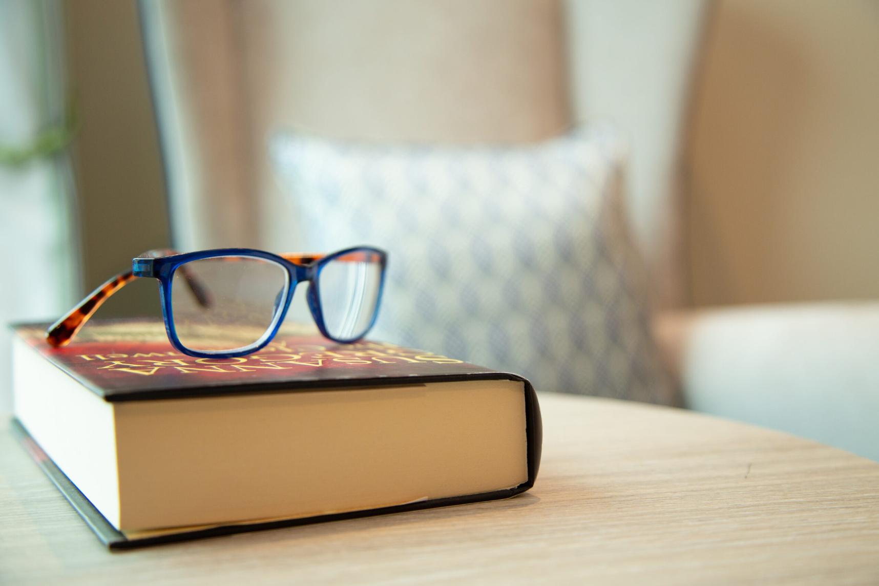 glasses-on-bedside-book